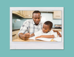 A parent assisting their son with homework.