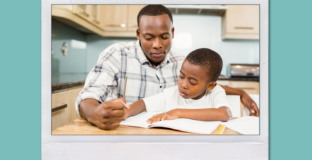 A parent assisting their son with homework.