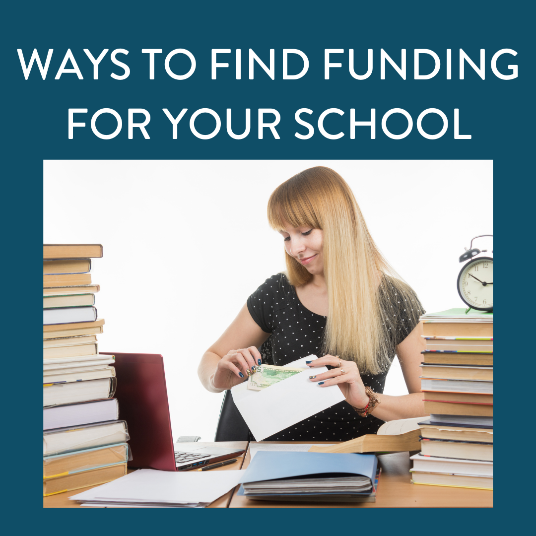Woman with stacks of paper around her, opening an envelope with money in it. Find funding for your school below!
