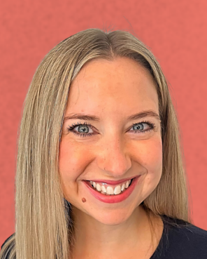 Headshot of Alyssa Collins with peach colored background