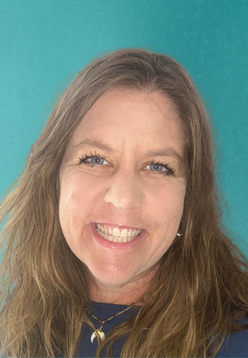 Beverly Hamm Headshot with teal background
